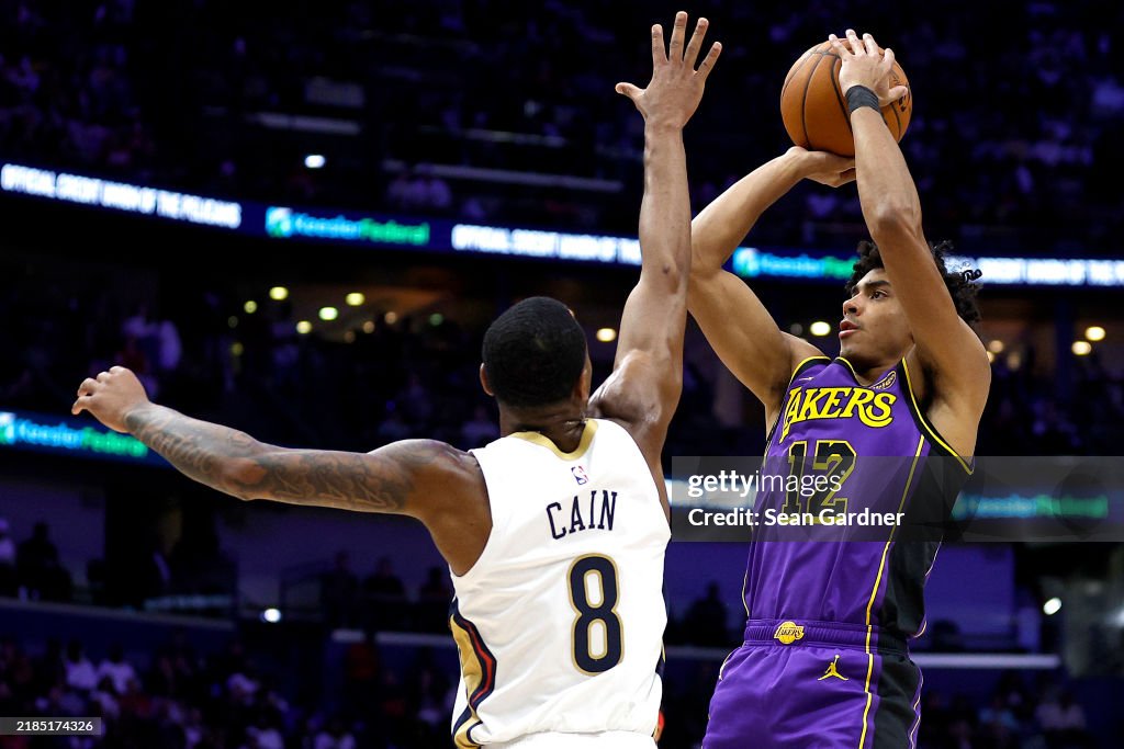 Max Cain Max Christie of the Los Angeles Lakers shoots over Jamal Cain of the ...