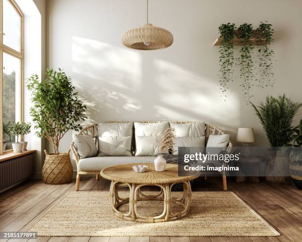 interior escandinavo moderno de inspiración boho con muebles de mimbre y plantas verdes - rattan plant fotografías e imágenes de stock