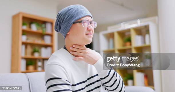 cancer patient pain when swallowing - thyroid cancer stock pictures, royalty-free photos & images