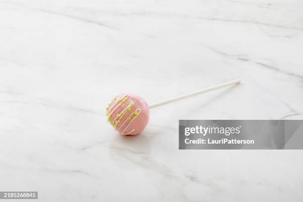 strawberry cream cake pop - cake pop stock pictures, royalty-free photos & images