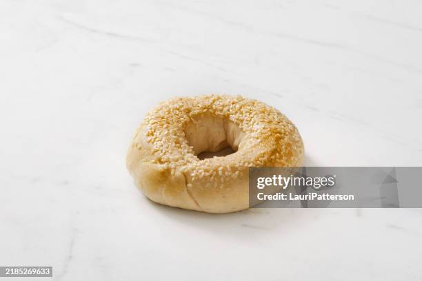 sesame seed bagel - sesame seed bun stock pictures, royalty-free photos & images