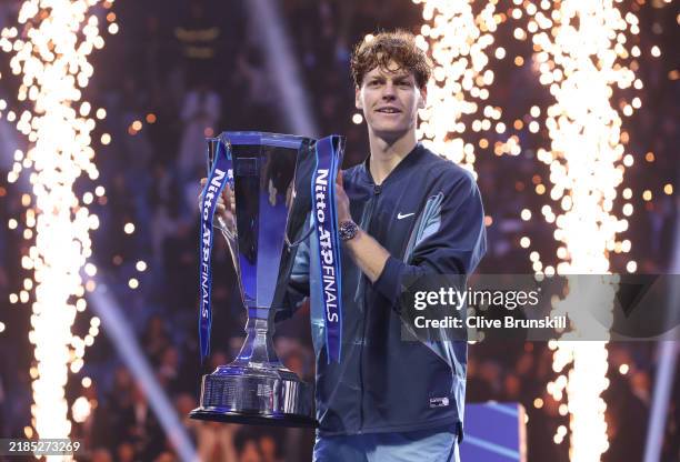 Jannik Sinner of Italy poses for a photo with the trophy after his victory against Taylor Fritz of United States during the Men's Singles final match...