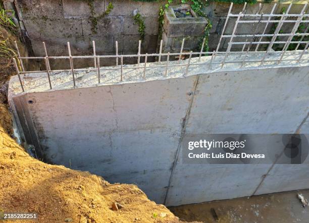 construction of a grey concrete wall. - formwork blocks stock pictures, royalty-free photos & images