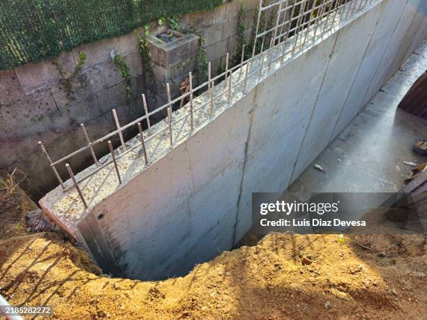 construction of a grey concrete wall. - formwork blocks stock pictures, royalty-free photos & images