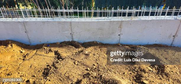 construction of a grey concrete wall. - formwork blocks stock pictures, royalty-free photos & images