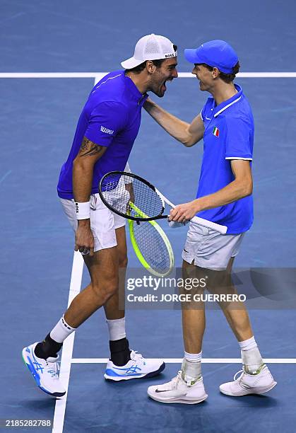 Matteo Berrettini and Jannik Sinner of Team Italy, celebrate beating Maximo Gonzalez and Andres Molteni of Team Argentina during their quarter-final...