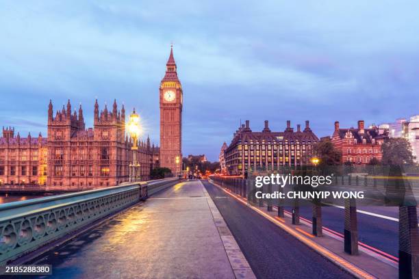 westminster bridge in london at evening - big ben stock pictures, royalty-free photos & images