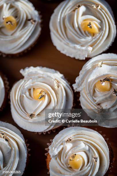 yuzu vanilla cupcakes delight - cake decorating stock pictures, royalty-free photos & images