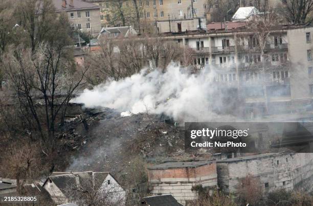 Pillar of smoke rises over a garage cooperative damaged by the Russian missile strike in Dnipro, Ukraine, on November 21, 2024. On Thursday morning,...