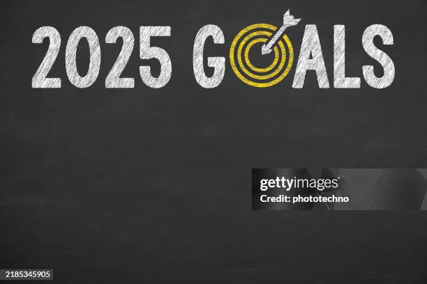 new year 2025 goals on chalkboard background - new year resolution stock illustrations
