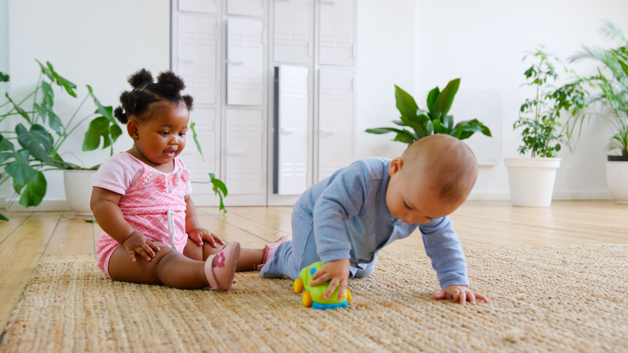 babies playing together