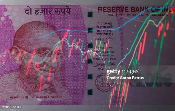 indian rupees against the background of economic data - indian currency stock pictures, royalty-free photos & images