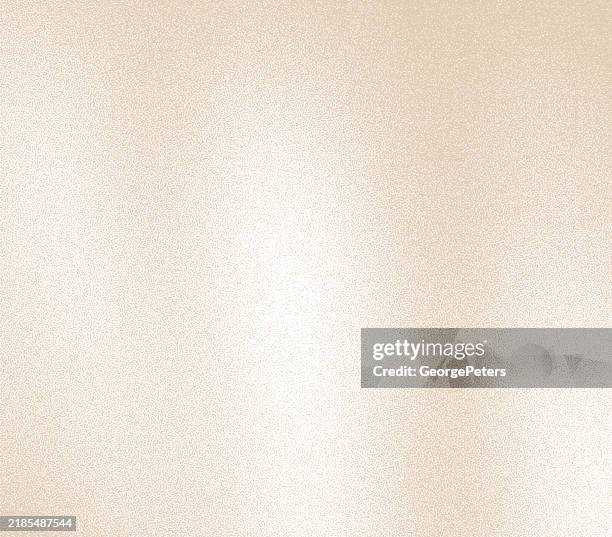 soft, spot lit grainy background - beige background stock illustrations