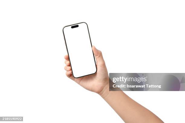 a hand holding a white cell phone - mano umana foto e immagini stock