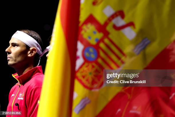 Rafael Nadal of Team Spain looks on as he lines up for the national anthems ahead of his singles match against Botic van de Zandschulp of Team...