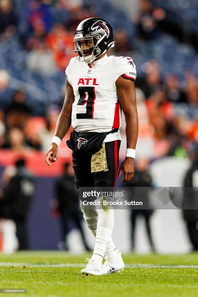 Michael Rimi Quarterback Michael Penix Jr. #9 of the Atlanta Falcons stands on the ...