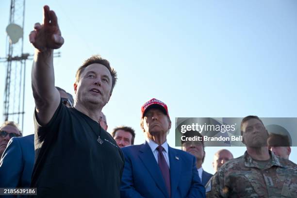 Elon Musk speaks with U.S. President-elect Donald Trump and guests at a viewing of the launch of the sixth test flight of the SpaceX Starship rocket...