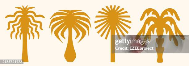golden palm tree silhouettes collection. minimalist palm tree icons set. decorative palm tree design elements. stylized palm trees vector collection. - southern california palm trees stock illustrations