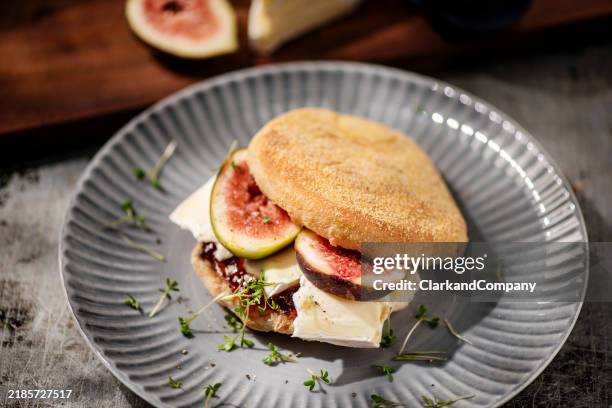 fig and brie english muffin - brie stock pictures, royalty-free photos & images