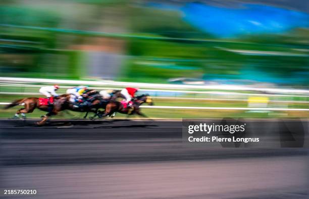 horse racing - unrecognizable location and riders, motion blur - horse racing stock pictures, royalty-free photos & images