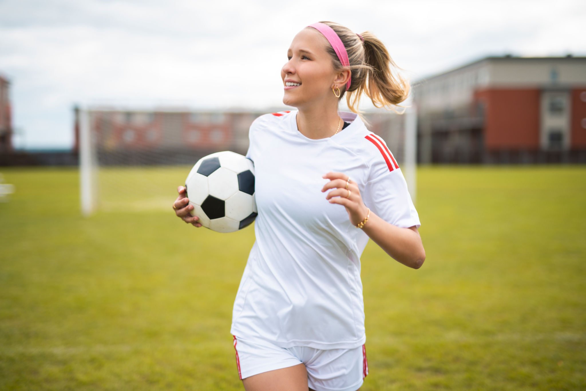 girl playing soccer