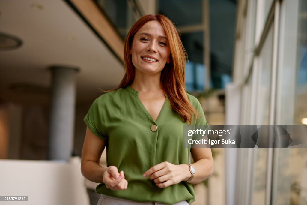 Confident Woman in a Modern Office Setting