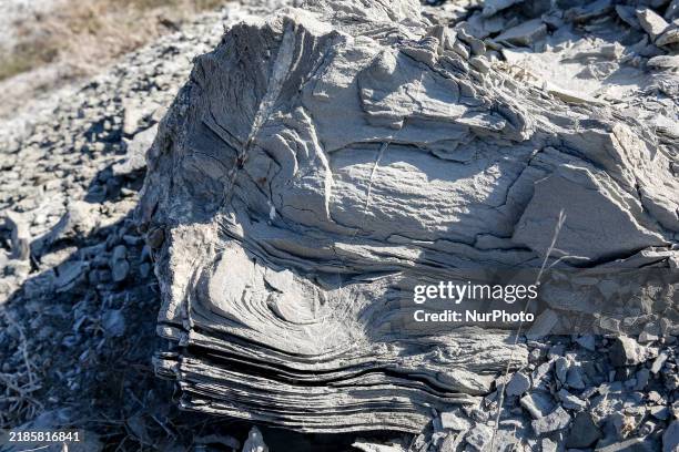 Piece of mud seen in an austere, harsh landscape of dry mud left on mud volcano in Gobustan region near Baku, Azerbaijan on November 24, 2024.