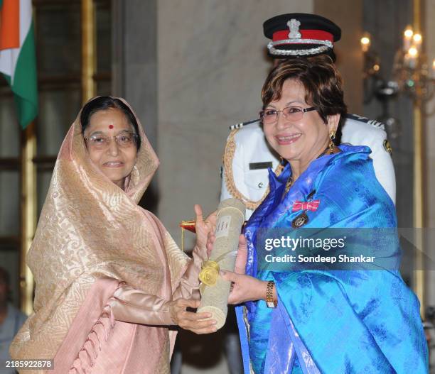 Actor Helen receives Padma Shree from President Pratibha Patil at the investiture ceremony at the Presidential Palace in New Delhi on Tuesday, April...