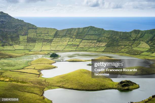 volcanic crater caldeirao, corvo island near flores, azores, portugal. aerial view - azores stock pictures, royalty-free photos & images