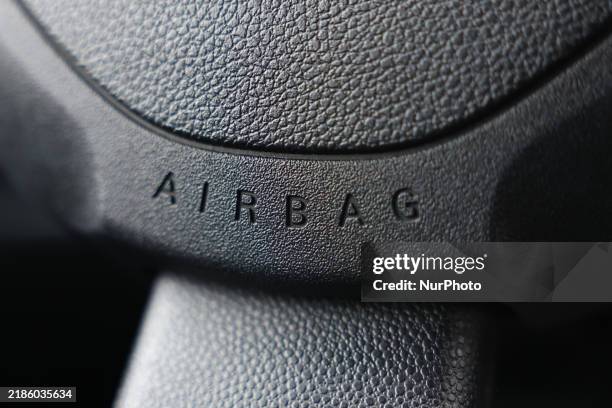 Airbag logo is seen on a steering wheel in Poland on November 24, 2024.
