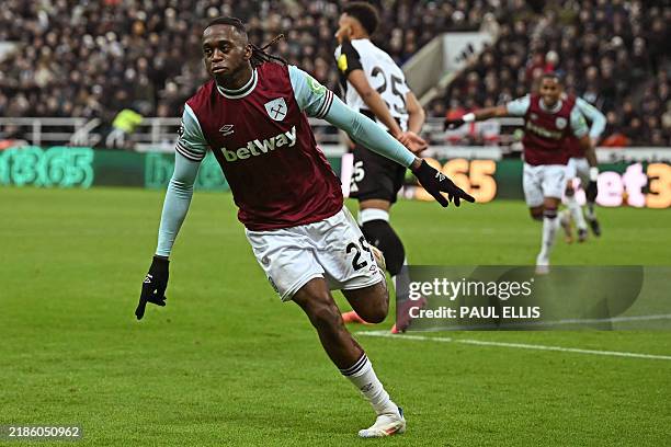 West Ham United's English defender Aaron Wan-Bissaka celebrates after scoring their second goal during the English Premier League football match...