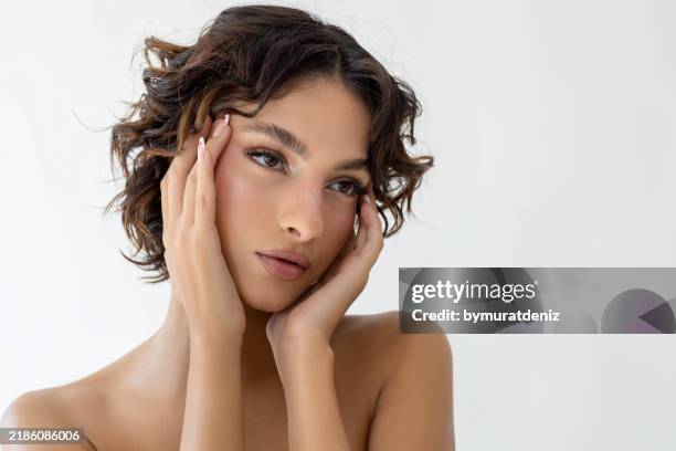 beautiful young woman with makeup - kajalschminke stock-fotos und bilder