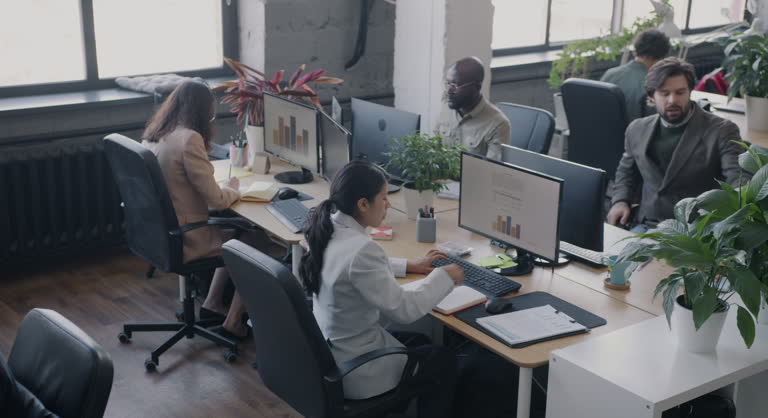 https://media.gettyimages.com/id/2186214306/video/high-angle-view-of-busy-coworking-center-with-diverse-group-of-people-employees-working-at.jpg?b=1&s=640x640&k=20&c=IKnf87iQTq1MOfFymoY1ZwhKGYUJJr-QZsI1OtPduBs=