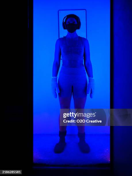 woman in a cryotherapy chamber - cryobiology stock pictures, royalty-free photos & images