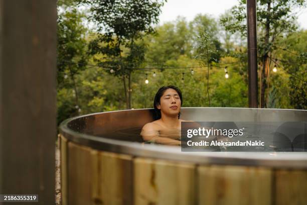 relaxing moments - taking a bath stock pictures, royalty-free photos & images