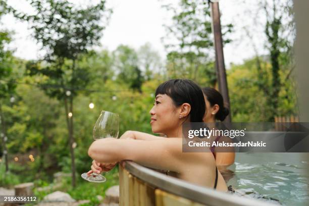 friendship - woman in hot tub stock pictures, royalty-free photos & images