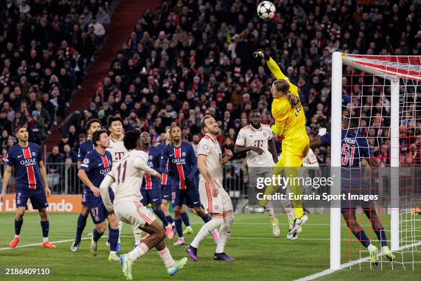 Goalkeeper Matvei Safonov of Paris Saint-Germain defends the ball during the UEFA Champions League 2024/25 League Phase MD5 match between FC Bayern...
