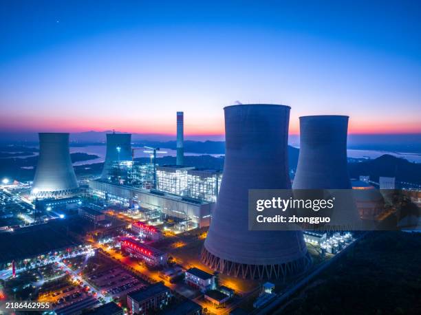 thermal power plant at sunset, modern concept - energiproduktion bildbanksfoton och bilder