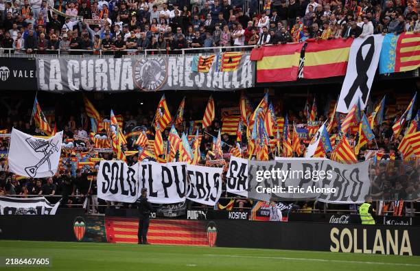General view inside the stadium as fans wave flags during the LaLiga match between Valencia CF and Real Betis Balompie at Estadio Mestalla on...
