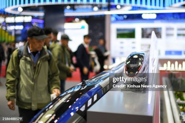 Guests visit the exhibition area of CRRC during the second China International Supply Chain Expo in Beijing, capital of China, Nov. 26, 2024. Themed...