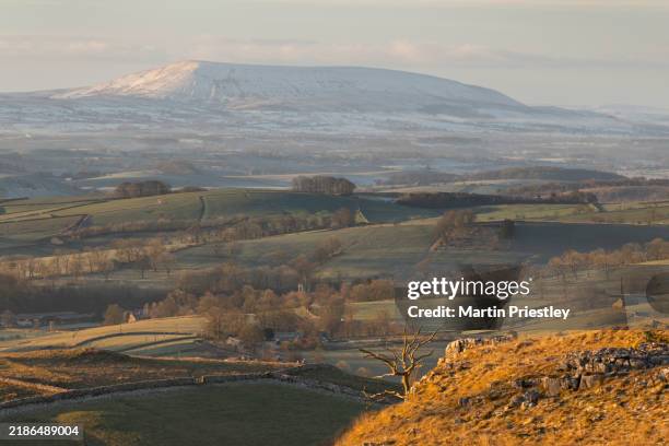 the view from malham lings, yorkshire dales, with a view towards pendle hill in the distance - hill stock pictures, royalty-free photos & images