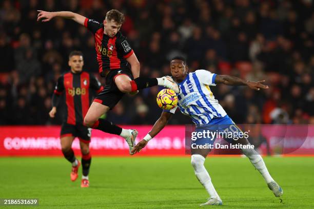 David Brooks of AFC Bournemouth controls the ball under pressure from Pervis Estupinan of Brighton & Hove Albion during the Premier League match...