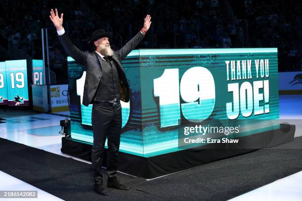 Joe Thornton waves to the crowd following a ceremony honoring him and retiring his jersey before the San Jose Sharks game against the Buffalo Sabres...