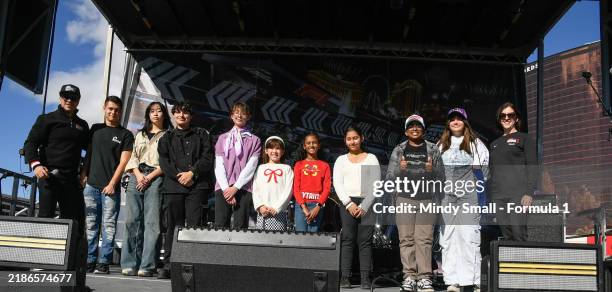 Host Mark Shunock poses with Clark County School District art contest winners Leo Ramirez, Peggy Weng, Maria Becerra, Gabrielle Peterson, Stella...