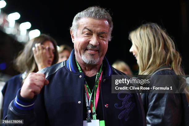 Sylvester Stallone poses for a photo on the grid prior to the F1 Grand Prix of Las Vegas at Las Vegas Strip Circuit on November 23, 2024 in Las...