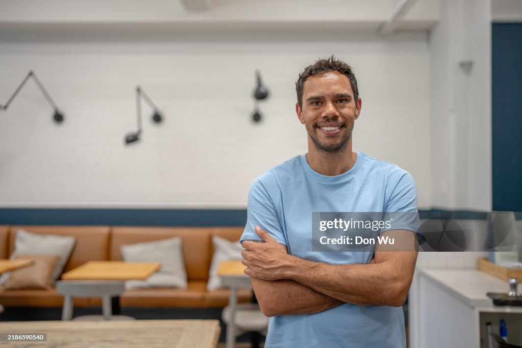 Confident Young Cafe Business Owner