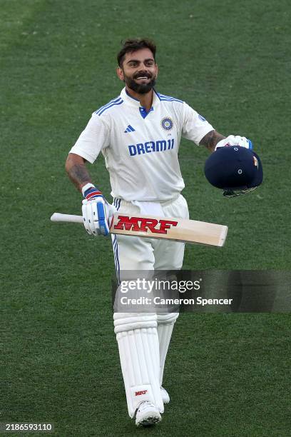 Virat Kohli of India celebrates reaching a century during day three of the First Test match in the series between Australia and India at Perth...