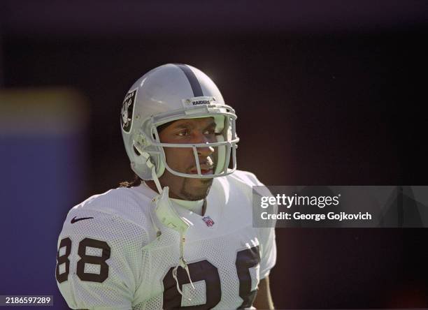 Wide receiver David Dunn of the Oakland Raiders looks on from the field before a game against the Pittsburgh Steelers at Three Rivers Stadium on...