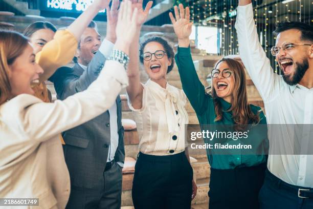 successful team - celebração imagens e fotografias de stock