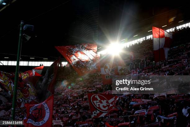 Fans of Kaiserslautern support their team during the Second Bundesliga match between 1. FC Kaiserslautern and Eintracht Braunschweig at...